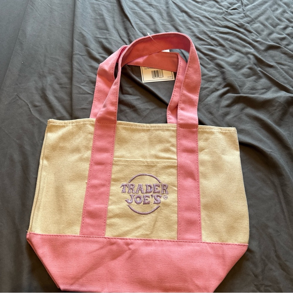 Trader Joe’s mini tote bag in pastel pink. NWT!